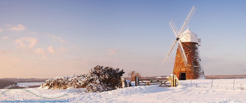slides/Late Winter Sunshine.jpg halnaker windmill south downs sussex louds mill fence snow winter blue sky clear day downland open access national park Late Winter Sunshine